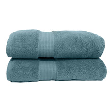 Load image into Gallery viewer, Two mint blue spa collection towels folded up.
